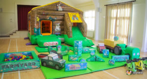 barn themed castle with large soft play set including tractor and hay bales