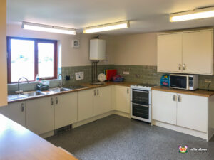 kitchen equipment oven and sinks.